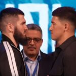 Artur Beterbiev stares at dmitry bivol at press conference face off