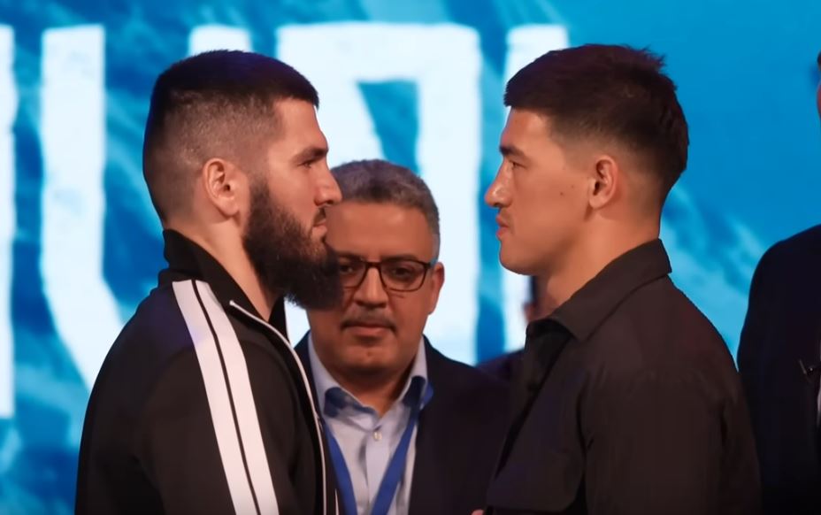 Artur Beterbiev stares at dmitry bivol at press conference face off