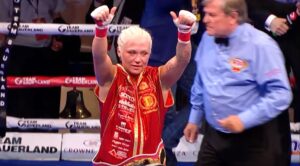 world champion Dina Thorslund celebrates victory in boxing ring