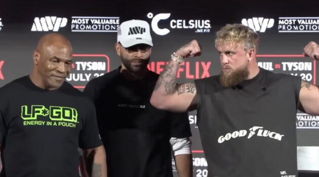 Boxing legend Mike Tyson and Jake Paul pose for photos at presser