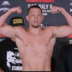 Nate Diaz flexing muscles after weigh in for his boxing match with Jorge Masvidal
