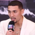 Boxer Teofimo Lopez white suit at press conference