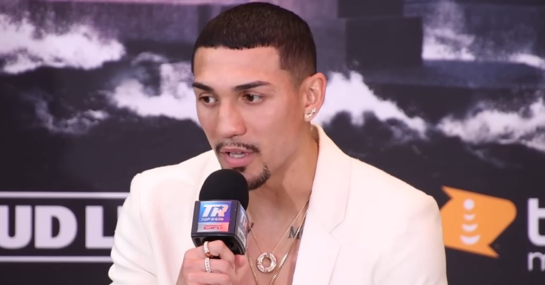 Boxer Teofimo Lopez white suit at press conference